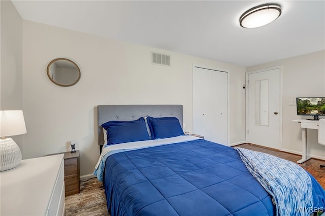 135 Charter Oaks Dr Unit 1, Amherst, NY 14228 - bedroom with wood finished floors and a closet
