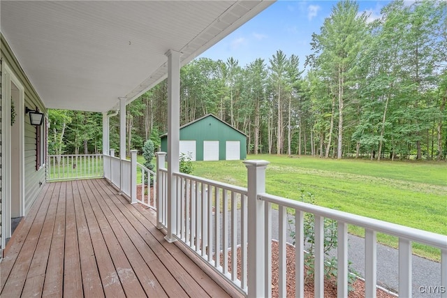 134 County Route 23a, Constantia, NY 13044 - porch with an outdoor structure, a yard, and a detached garage