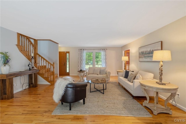 134 County Route 23a, Constantia, NY 13044 - living room with stairway and wood finished floors