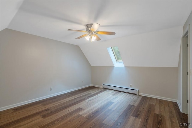 134 County Route 23a, Constantia, NY 13044 - additional living space featuring a baseboard heating unit, a skylight, lofted ceiling, ceiling fan, and wood finished floors