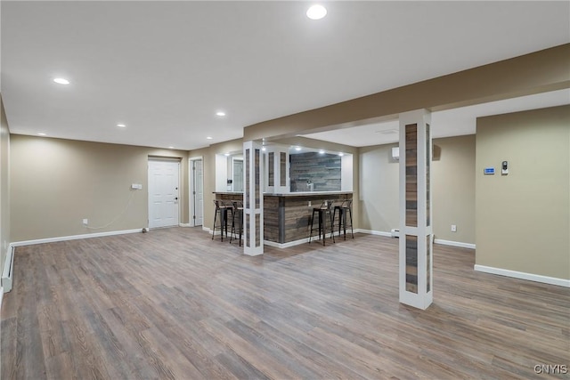 134 County Route 23a, Constantia, NY 13044 - finished basement with bar with sink, wood finished floors, and recessed lighting