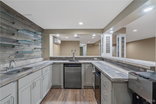 134 County Route 23a, Constantia, NY 13044 - bar area with dishwashing machine, wood finished floors, backsplash, and recessed lighting