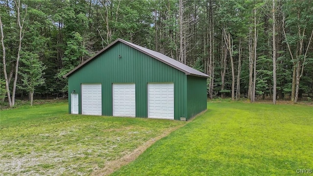134 County Route 23a, Constantia, NY 13044 - detached garage featuring a forest view