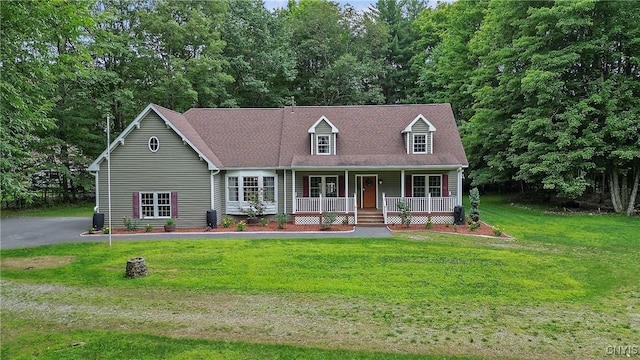 134 County Route 23a, Constantia, NY 13044 - cape cod house featuring a porch and a front yard