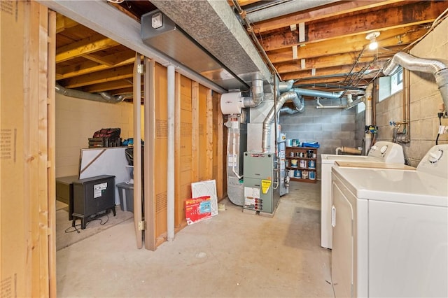 24 Huntsman, Webster, NY 14580 - basement featuring independent washer and dryer, heating unit, and concrete block wall