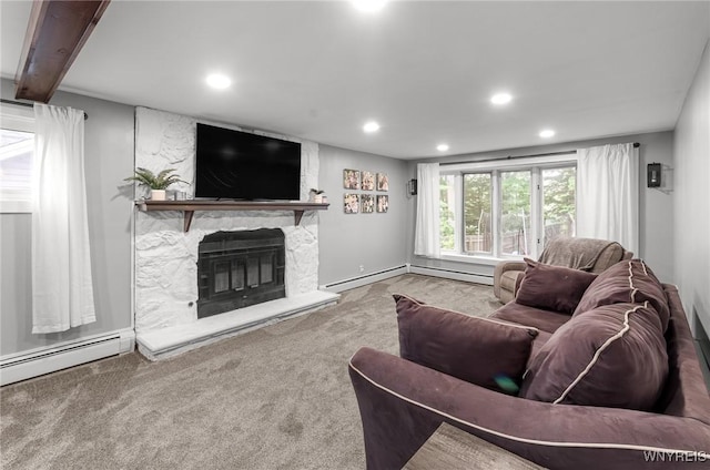 130 Hi View Ter, West Seneca, NY 14224 - living room with recessed lighting, carpet, a stone fireplace, and a baseboard radiator