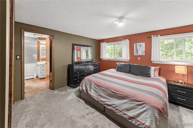 130 Hi View Ter, West Seneca, NY 14224 - bedroom featuring carpet floors, baseboard heating, a textured ceiling, and ensuite bathroom