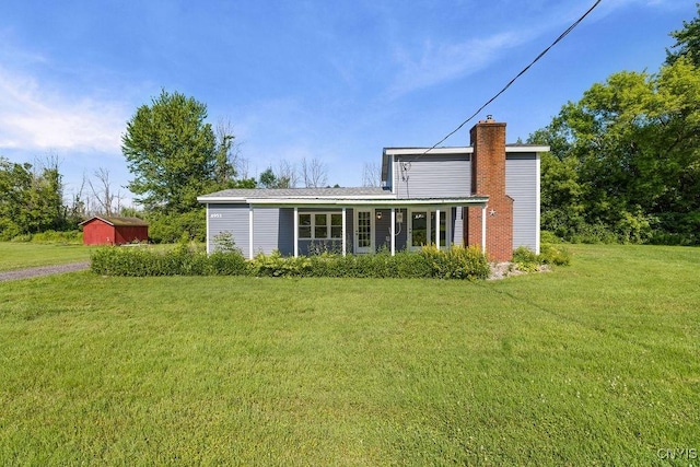 8953 Bushnell Shore Rd, Sullivan, NY 13037 - back of house with a chimney and a yard