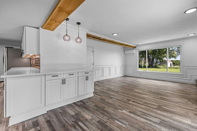 8953 Bushnell Shore Rd, Sullivan, NY 13037 - kitchen with white cabinets, dark wood-style floors, recessed lighting, light countertops, and pendant lighting