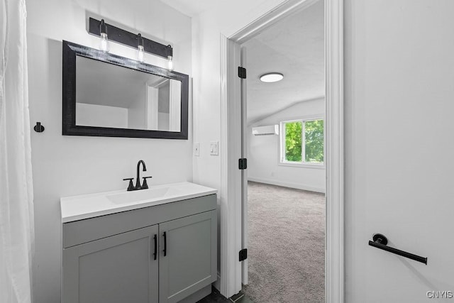 8953 Bushnell Shore Rd, Sullivan, NY 13037 - bathroom with a wall unit AC, vaulted ceiling, and vanity