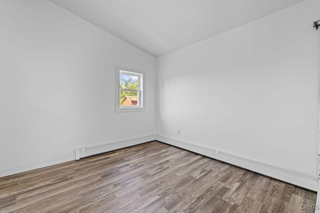 8953 Bushnell Shore Rd, Sullivan, NY 13037 - unfurnished room featuring lofted ceiling and wood finished floors
