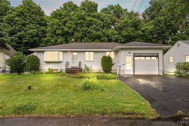 178 Wainwright Ave, Syracuse, NY 13208 - single story home featuring asphalt driveway, a garage, and a front lawn