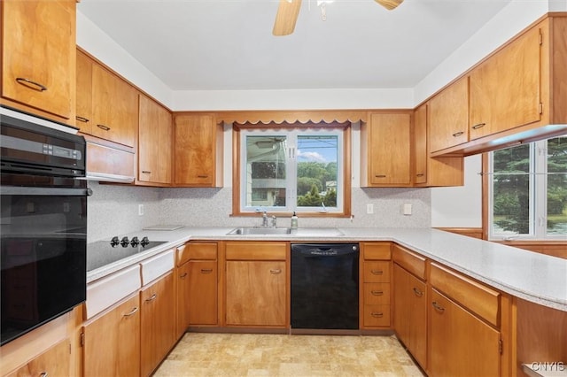 178 Wainwright Ave, Syracuse, NY 13208 - kitchen with black appliances, light countertops, decorative backsplash, and ceiling fan