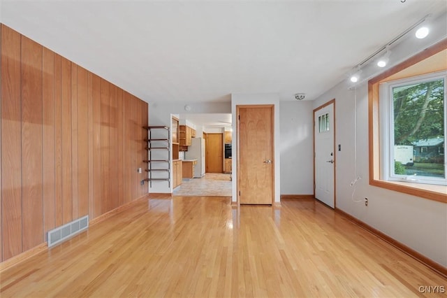 178 Wainwright Ave, Syracuse, NY 13208 - spare room with light wood finished floors and rail lighting