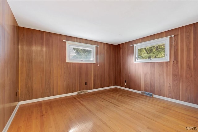 178 Wainwright Ave, Syracuse, NY 13208 - unfurnished room with plenty of natural light and light wood-style floors