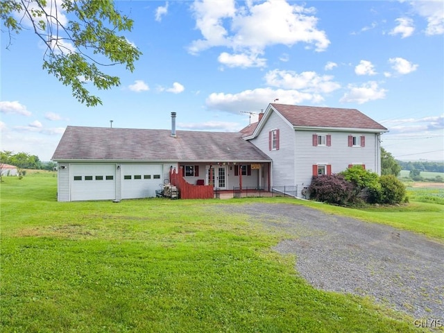 6767 Stauber Rd, Summerhill, NY 13073 - traditional-style house featuring driveway, a front yard, a garage, and a porch