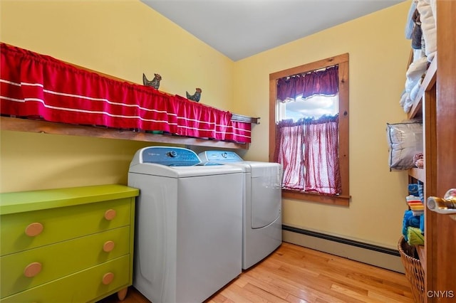 6767 Stauber Rd, Summerhill, NY 13073 - washroom featuring baseboard heating, independent washer and dryer, and wood finished floors