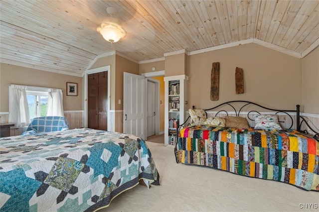 6767 Stauber Rd, Summerhill, NY 13073 - bedroom featuring vaulted ceiling, wainscoting, carpet flooring, wood ceiling, and crown molding