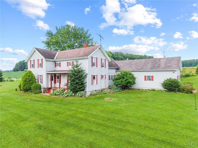 6767 Stauber Rd, Summerhill, NY 13073 - view of front of house with a chimney and a front lawn