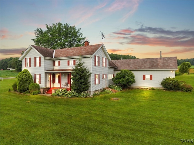 6767 Stauber Rd, Summerhill, NY 13073 - view of front of property with a chimney, a lawn, and a porch