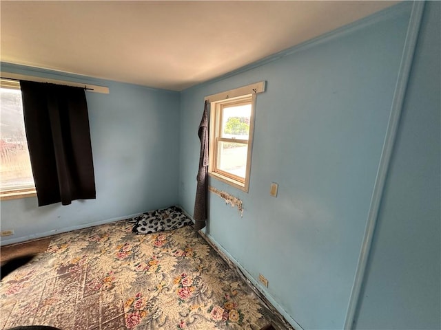 135 William St, Palmyra, NY 14522 - empty room with baseboards