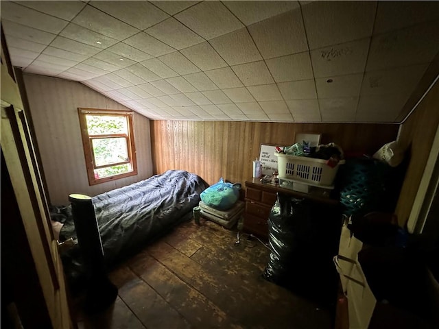 135 William St, Palmyra, NY 14522 - bedroom with hardwood / wood-style flooring, lofted ceiling, and wooden walls