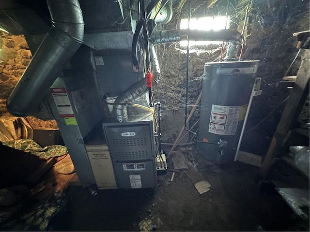 135 William St, Palmyra, NY 14522 - utility room featuring water heater and heating unit