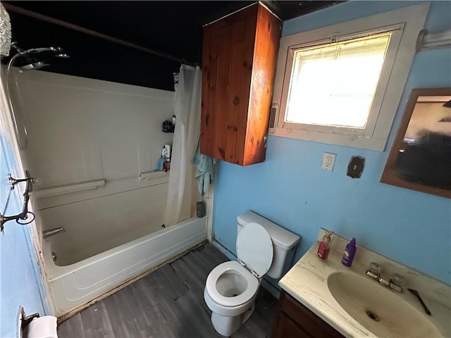 135 William St, Palmyra, NY 14522 - bathroom with vanity, shower / tub combo, and wood finished floors