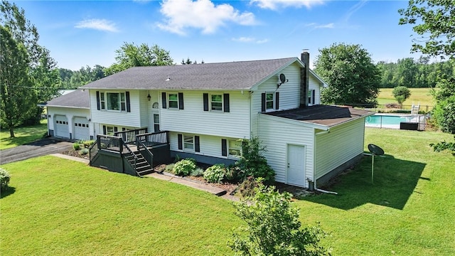 1292 Gassner Rd, Junius, NY 13165 - view of front of property with a chimney, a front lawn, a garage, and a shingled roof