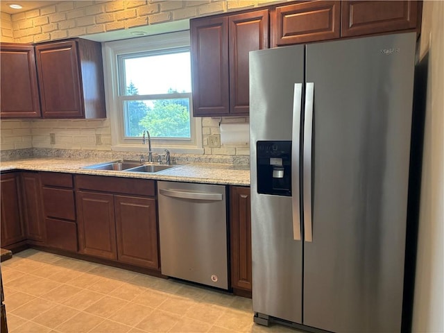 1292 Gassner Rd, Junius, NY 13165 - kitchen featuring stainless steel appliances, backsplash, and light stone counters