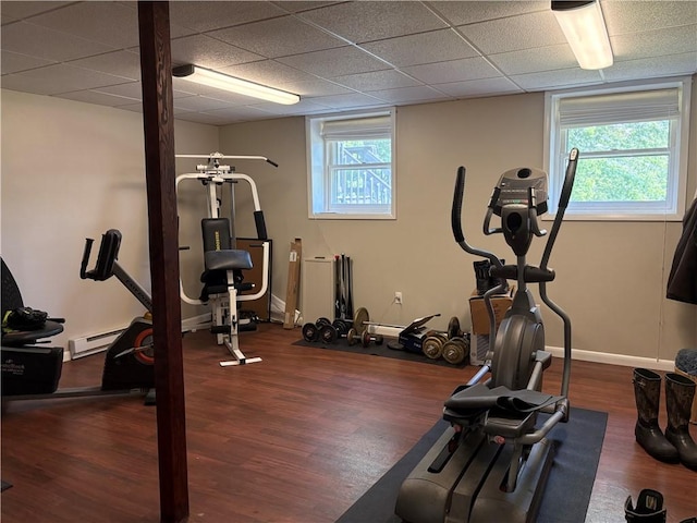 1292 Gassner Rd, Junius, NY 13165 - workout room featuring wood finished floors, baseboard heating, and a drop ceiling