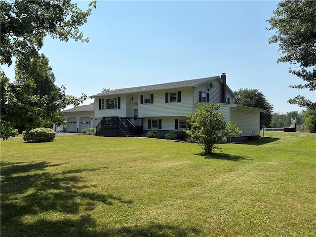 1292 Gassner Rd, Junius, NY 13165 - view of front of property featuring a front yard, a chimney, an attached garage, and stairs