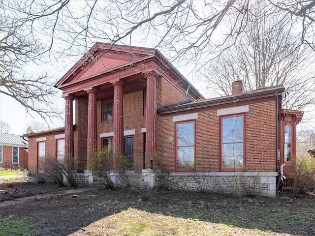 11139 S Lake Rd, Pavilion, NY 14525 - view of front of property with brick siding and a chimney