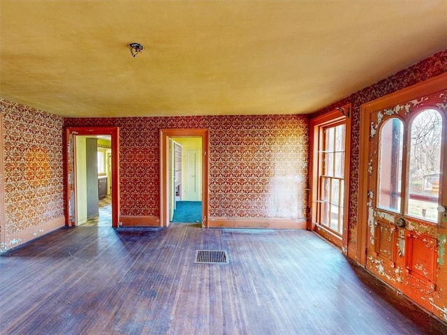 11139 S Lake Rd, Pavilion, NY 14525 - empty room featuring wood finished floors and wallpapered walls