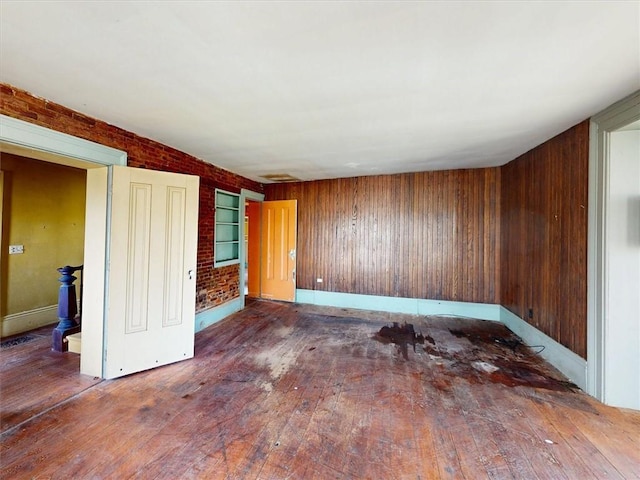 11139 S Lake Rd, Pavilion, NY 14525 - empty room with hardwood / wood-style floors and wood walls
