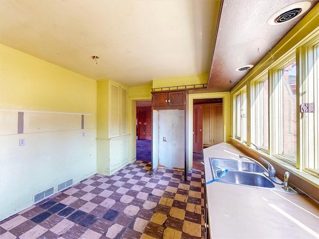 11139 S Lake Rd, Pavilion, NY 14525 - kitchen with dark flooring and light countertops