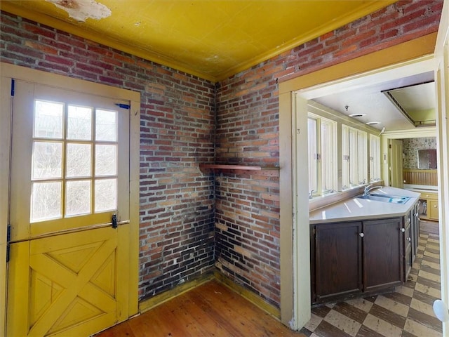 11139 S Lake Rd, Pavilion, NY 14525 - kitchen with tile patterned floors, light countertops, and dark brown cabinets