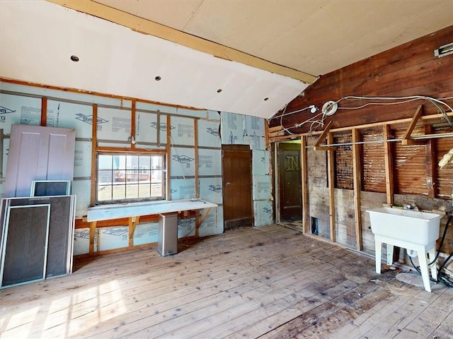 11139 S Lake Rd, Pavilion, NY 14525 - misc room with lofted ceiling, hardwood / wood-style flooring, and wooden walls