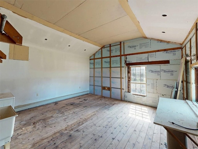 11139 S Lake Rd, Pavilion, NY 14525 - unfurnished living room with vaulted ceiling and wood-type flooring