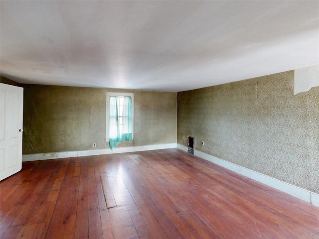 11139 S Lake Rd, Pavilion, NY 14525 - spare room featuring wood-type flooring and baseboards