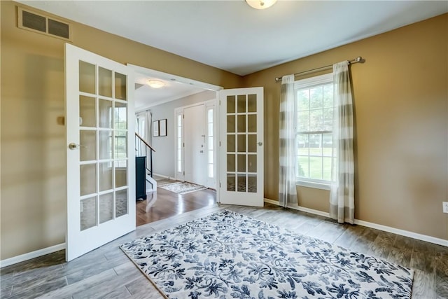 1125 Shoecraft Rd, Webster, NY 14580 - doorway to outside with french doors and wood finished floors