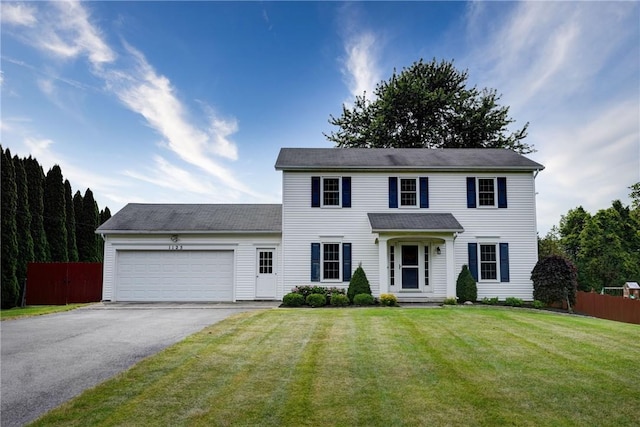 1125 Shoecraft Rd, Webster, NY 14580 - colonial home with asphalt driveway and a garage