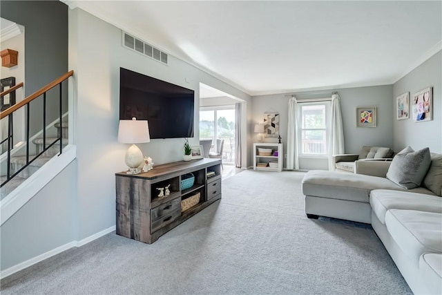 1125 Shoecraft Rd, Webster, NY 14580 - carpeted living room with ornamental molding and stairs
