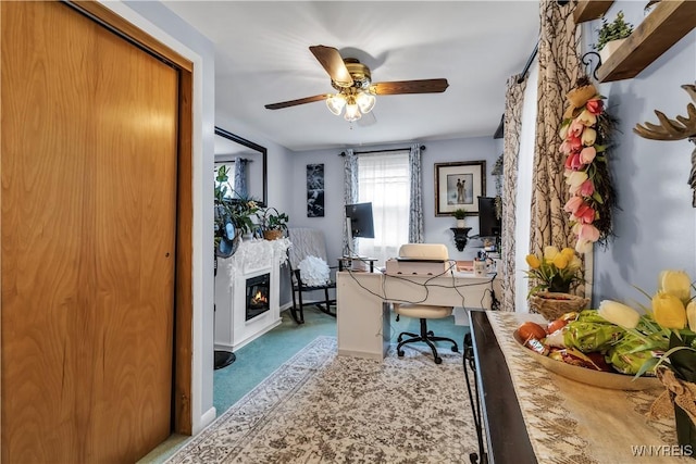 204 French Lea Rd, West Seneca, NY 14224 - carpeted office space with a glass covered fireplace and ceiling fan