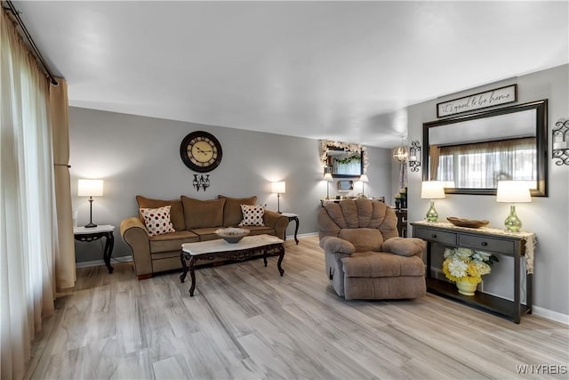 204 French Lea Rd, West Seneca, NY 14224 - living area featuring light wood-style flooring and baseboards