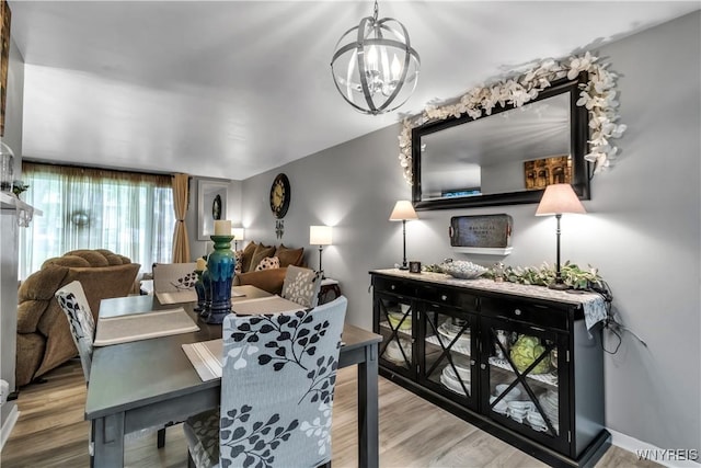 204 French Lea Rd, West Seneca, NY 14224 - dining room featuring a chandelier and wood finished floors