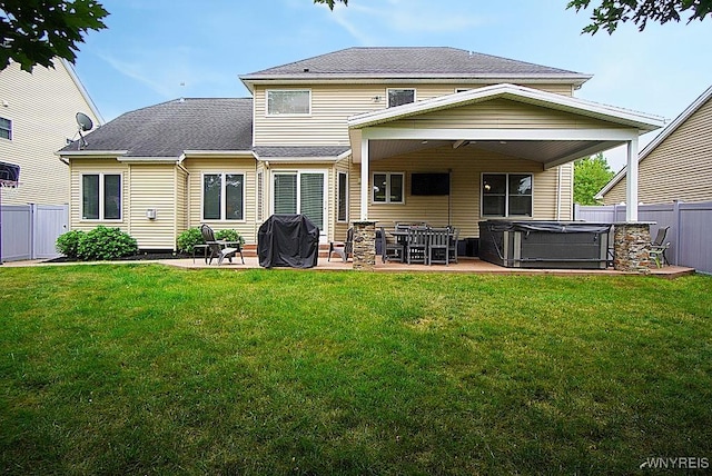 47 Timber Cove Ct, Amherst, NY 14051 - rear view of property featuring a hot tub, a patio, a fenced backyard, and a shingled roof