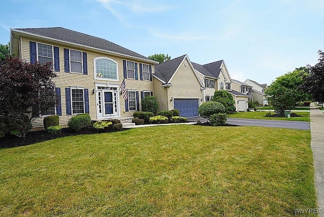 47 Timber Cove Ct, Amherst, NY 14051 - colonial inspired home with asphalt driveway, a front yard, and a residential view