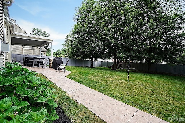 47 Timber Cove Ct, Amherst, NY 14051 - fenced backyard with a patio area and a playground