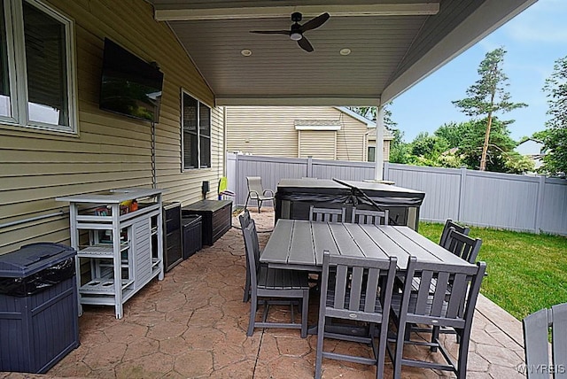 47 Timber Cove Ct, Amherst, NY 14051 - fenced backyard featuring a hot tub, a patio area, outdoor dining space, and ceiling fan